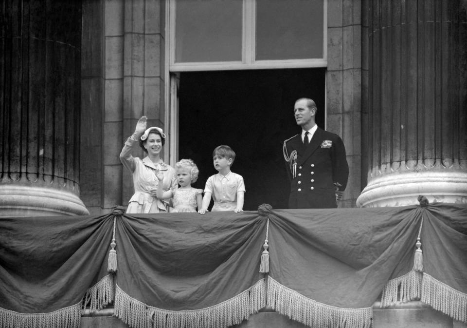 1954: Prince Charles and Princess Anne stand with their parents, the Queen and Duke of Edinburgh, on the balcony of Buckingham Palace following their return from the Commonwealth tour (PA)