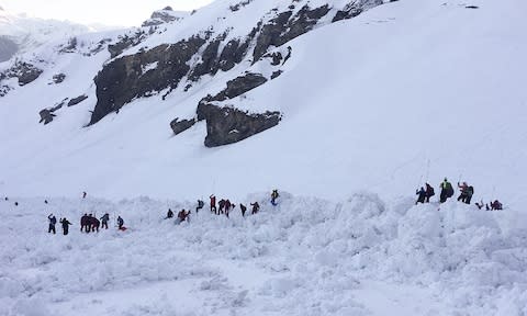 rescue workers avalanche crans montana - Credit: POLICE CANTONALE VALAISANNE/AFP PHOTO