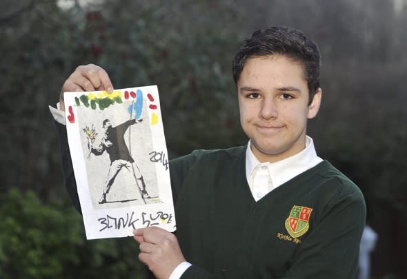 Train passenger calls himself Banksy and gives schoolboy art 'worth £20k'