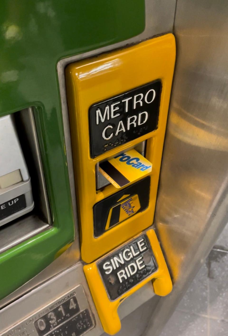 Refilling my MetroCard at Jamaica Station.