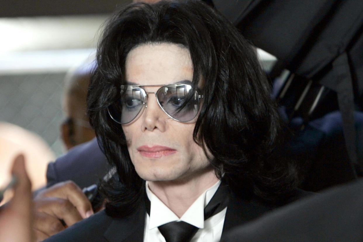 Michael Jackson prepares to enter the Santa Barbara County Superior Court to hear the verdict read in his child molestation case on 13 June, 2005 in Santa Maria, California: Kevork Djansezian-Pool/Getty Images