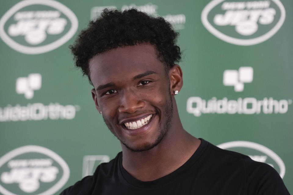 New York Jets' Garrett Wilson talks to reporters after a joint practice with the Tampa Bay Buccaneers at the Jets' training facility in Florham Park, N.J., Wednesday, Aug. 16, 2023. (AP Photo/Seth Wenig)