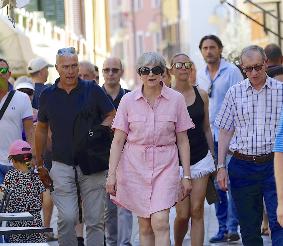 Theresa May Italy holiday pink dress sunglasses