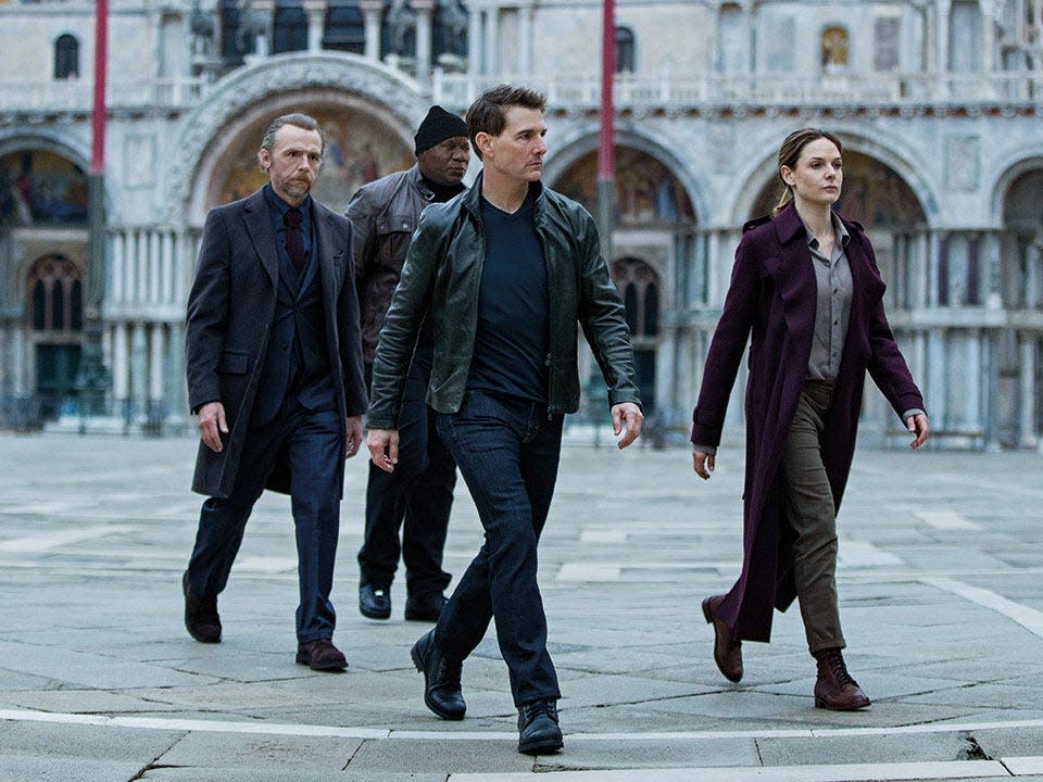 Simon Pegg as Benji Dunn, Ving Rhames as Luther Stickell, Tom Cruise as Ethan Hunt, and Rebecca Ferguson as Ilsa Faust in "Mission: Impossible - Dead Reckoning Part One."