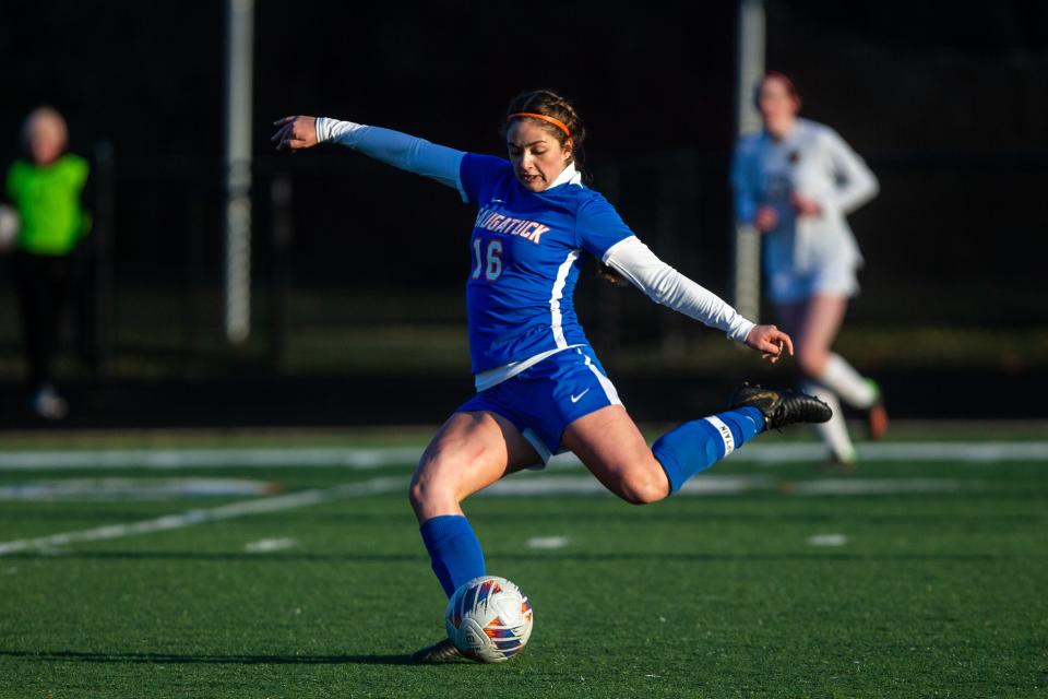 Saugatuck's Adele Nieuwsma clears the ball down the field Monday, March 27, 2023, at Saugatuck High School. 