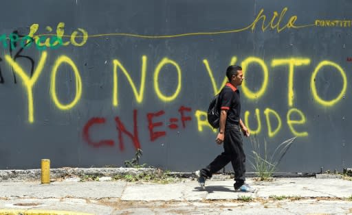 "I'm not voting" reads graffiti sprayed on a wall in Caracas a day before Venezuela's election which saw a historic abstention rate of 52%