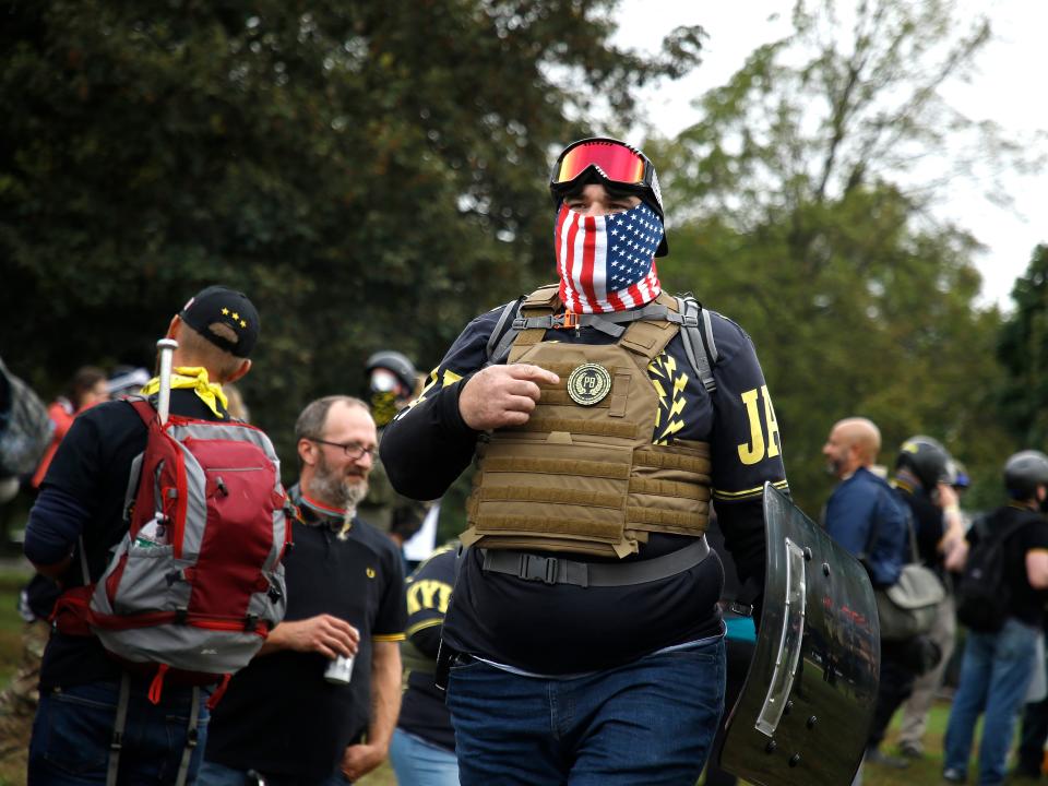 A member of the far-right Proud Boys wearing military gear.