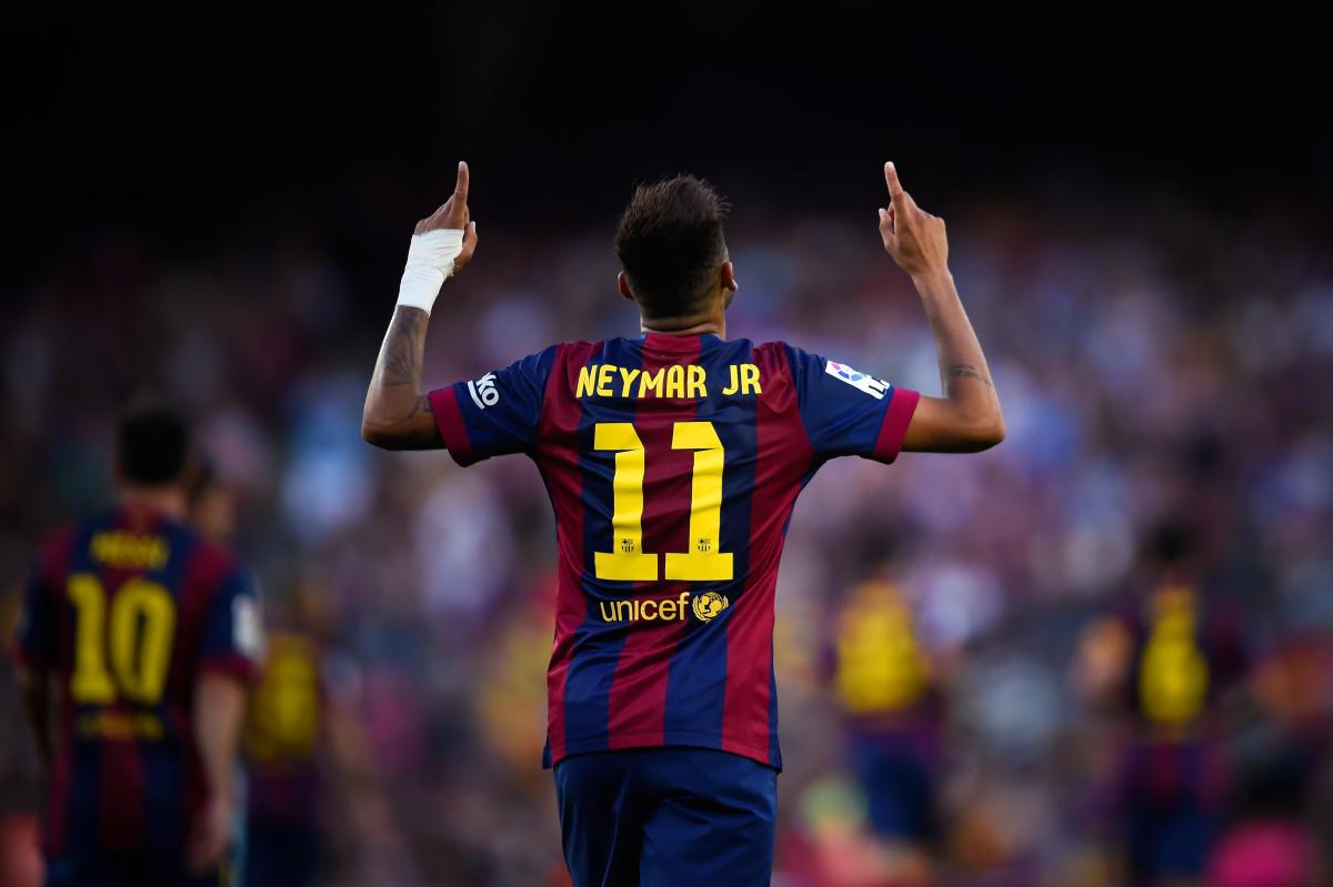 Neymar signs with Paris Saint-Germain from Barcelona, shattering transfer  world record