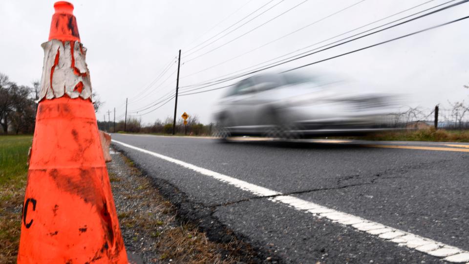 A car travels along Irick Road in Westampton Township. Repaving started recently on a portion of the road. PHOTO: March 28, 2024.