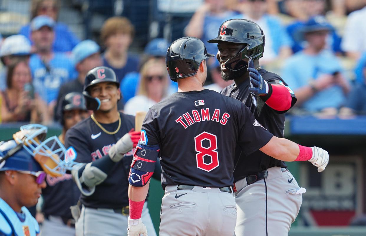 Cleveland Guardians' Lane Thomas (8) is congratulated by teammates Jhonkensy Noel (43) and Brayan Rocchio (4) after hitting a home run in the fifth inning against the Kansas City Royals on Monday in Kansas City.