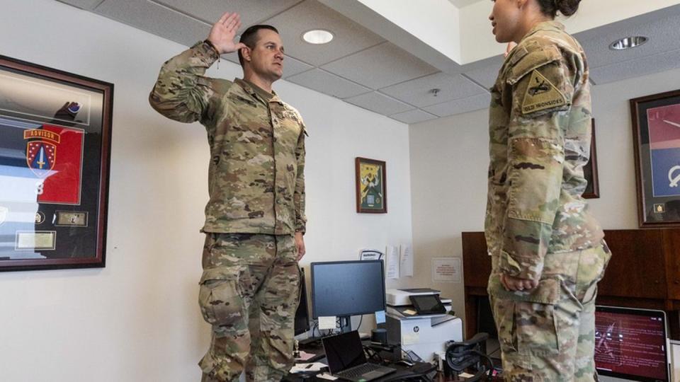 Staff Sgt. Justin Smith, left, during his Sept. 5, 2023 reenlistment ceremony. (Photo courtesy of Staff Sgt. Justin Smith.)