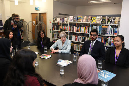 Britain's Prime Minister Theresa May visits the Featherstone High School in Southall in London, Britain, Febuary 19, 2018. REUTERS/Jeremy Selwyn/Pool