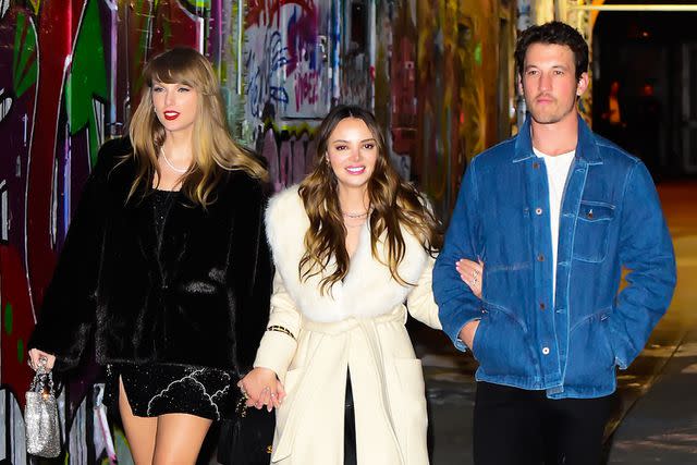 <p>Raymond Hall/GC</p> Taylor Swift with Keleigh and Miles Teller in New York City on Dec. 13, 2023