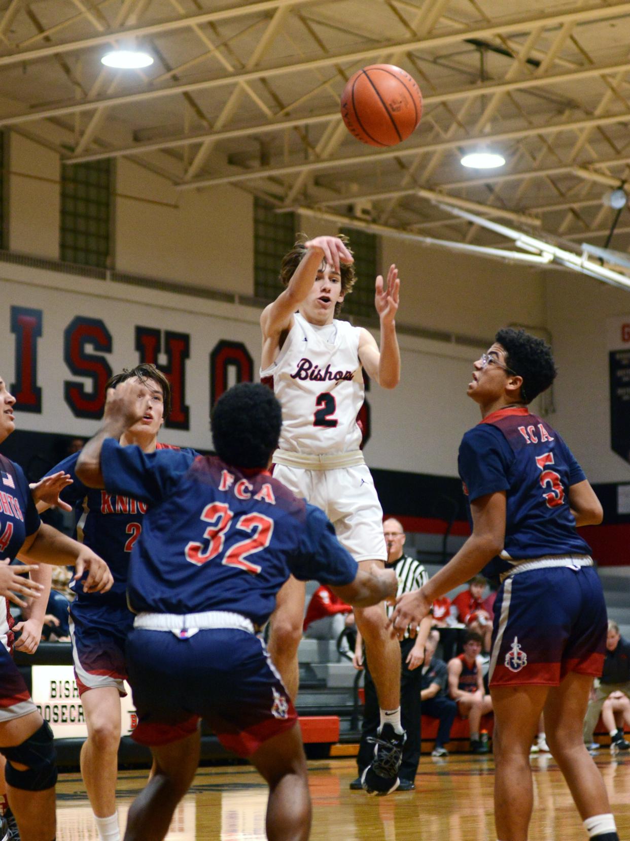 Grady Labishak passes to a teammate during Rosecrans' 47-44 win against visiting Fairfield Christian on Thursday at Rogge Gymnasium in Zanesviille.