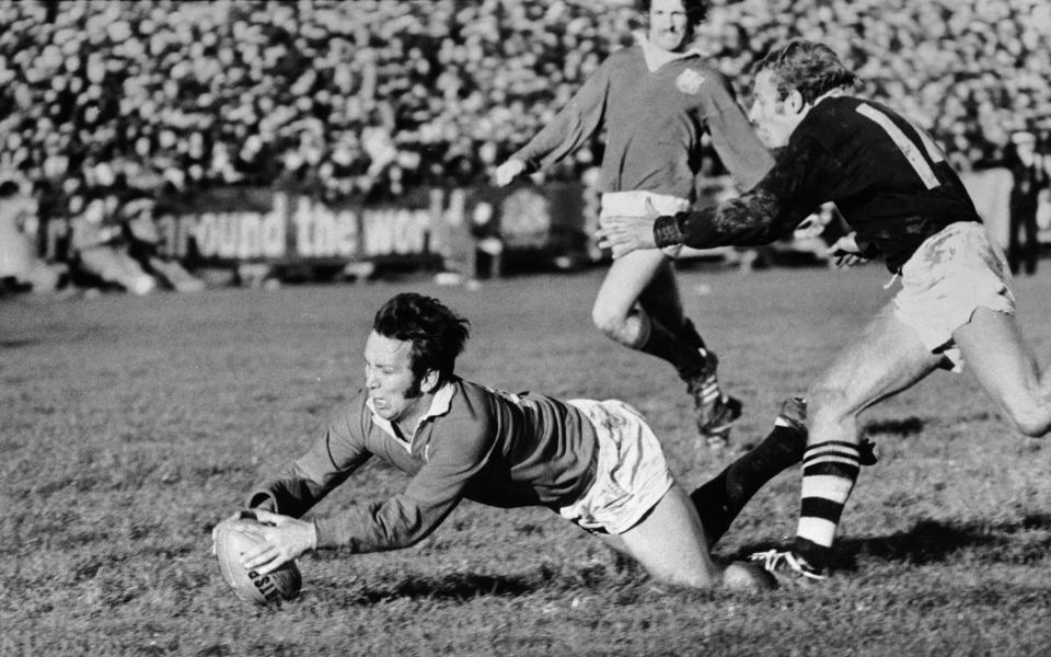 British Lions captain John Dawes gets over the line for a try despite the efforts of Otago winger Bruce Hunter, 18th June 1971 - Central Press/Hulton Archive/Getty Images