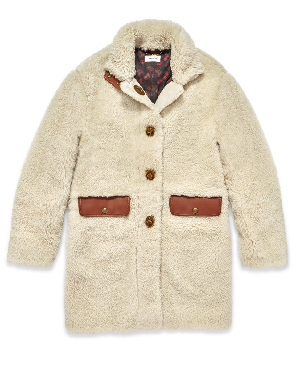 This photo shows a Coach shearling coat in cream. From tablescapes to apparel, the gift possibilities in white are endless for the holidays. (AP Photo/Coach)