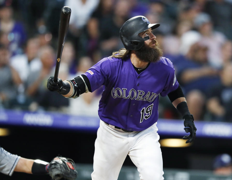 Colorado Rockies' Charlie Blackmon watches his solo home run off San Diego Padres starting pitcher Matt Strahm during the fourth inning of a baseball game Thursday, June 13, 2019, in Denver. (AP Photo/David Zalubowski)