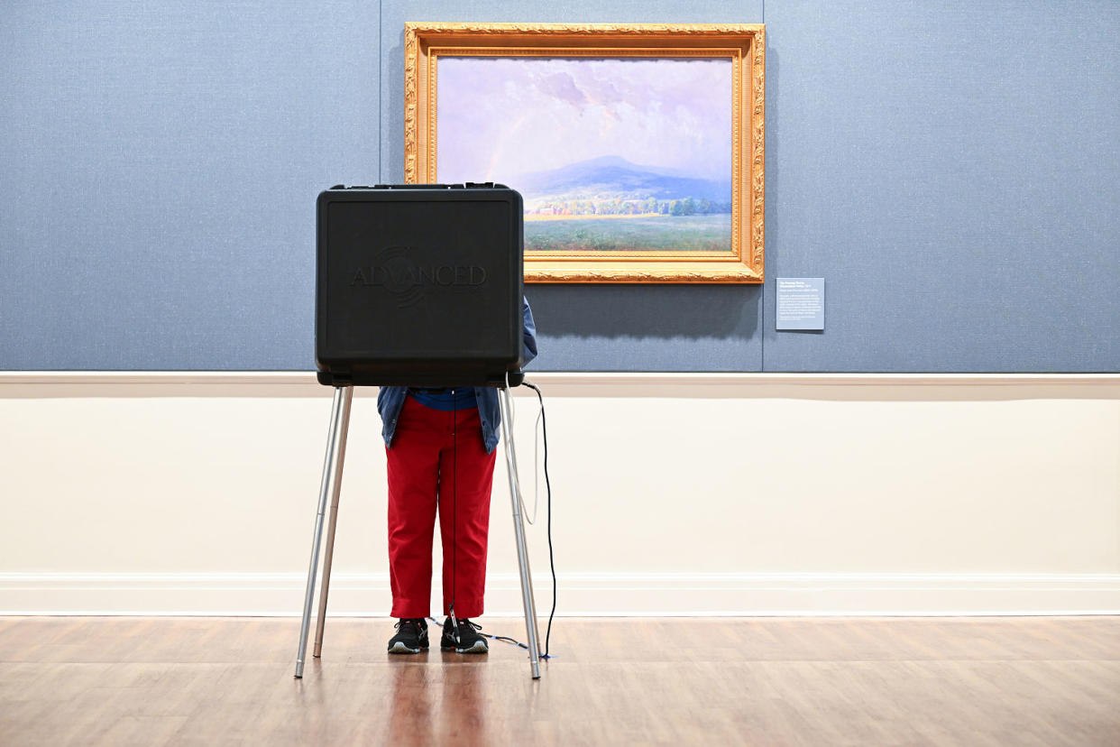 A voter at the Virginia Museum of History and Culture in Richmond in March.  (Matt McClain / The Washington Post via Getty Images file)