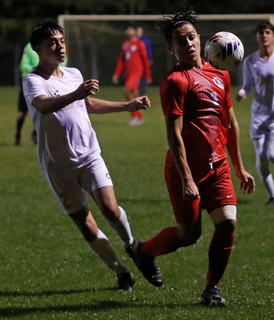 West Lafayette Red Devils defender Erik Pacheco (3) fields the ball during the IHSAA boys soccer regional game against the Bishop Noll Warriors, Wednesday, Oct. 12, 2022, at West Lafayette High School in West Lafayette, Ind. 