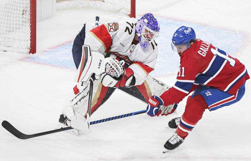 Montreal Canadiens' Brendan Gallagher (11) moves in on Florida Panthers goaltender Sergei Bobrovsky (72) during the first period of an NHL hockey game in Montreal, Thursday, November 30, 2023. (Graham Hughes/The Canadian Press via AP)