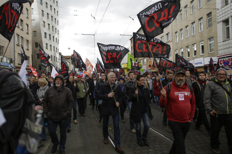 Thousands of demonstrators protest against the planned Transatlantic Trade and Investment Partnership (TTIP) and the Comprehensive Economic and Trade Agreement (CETA) ahead of a visit by President Obama in Hanover, Germany, April 23, 2016. (Markus Schreiber/AP)