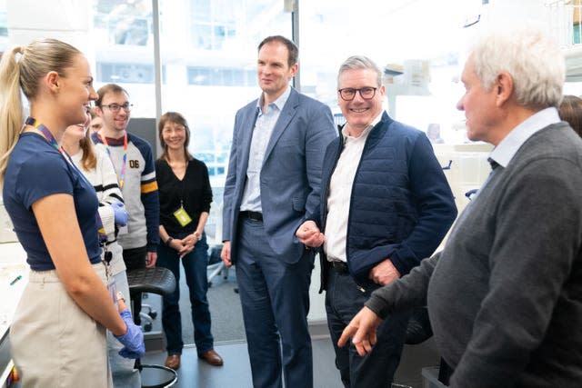 Labour Party leader Sir Keir Starmer welcomes MP and psychiatrist Dr Dan Poulter to the Labour Party at the Francis Crick Institute in London