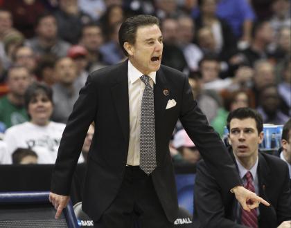 Louisville head coach Rick Pitino yells to his team during their Sweet 16 win over N.C. State. (AP)