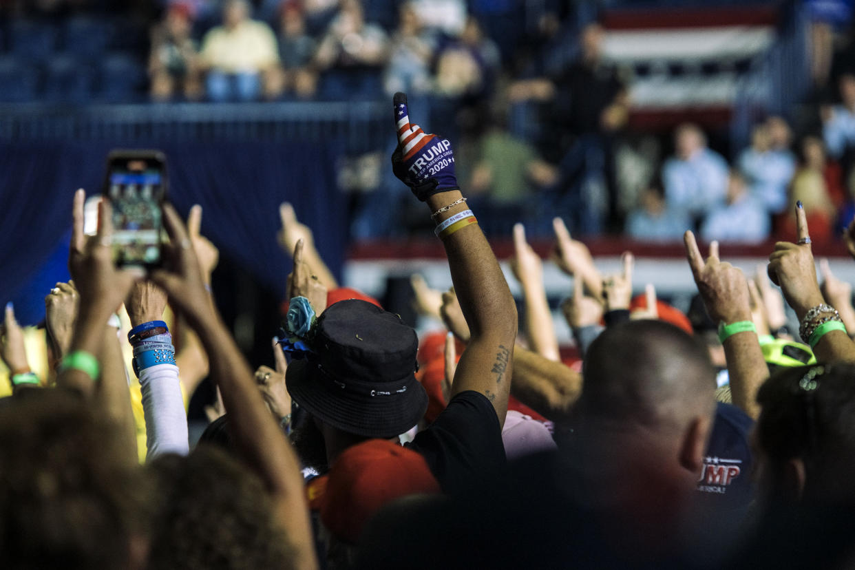 Image: The crowd holds up their index fingers at a campaign rally hosted by former President Donald Trump in support of Ohio Senate candidate JD Vance in Youngstown on Sept. 17, 2022. (Andrew Spear / The Washington Post via Getty Images file)