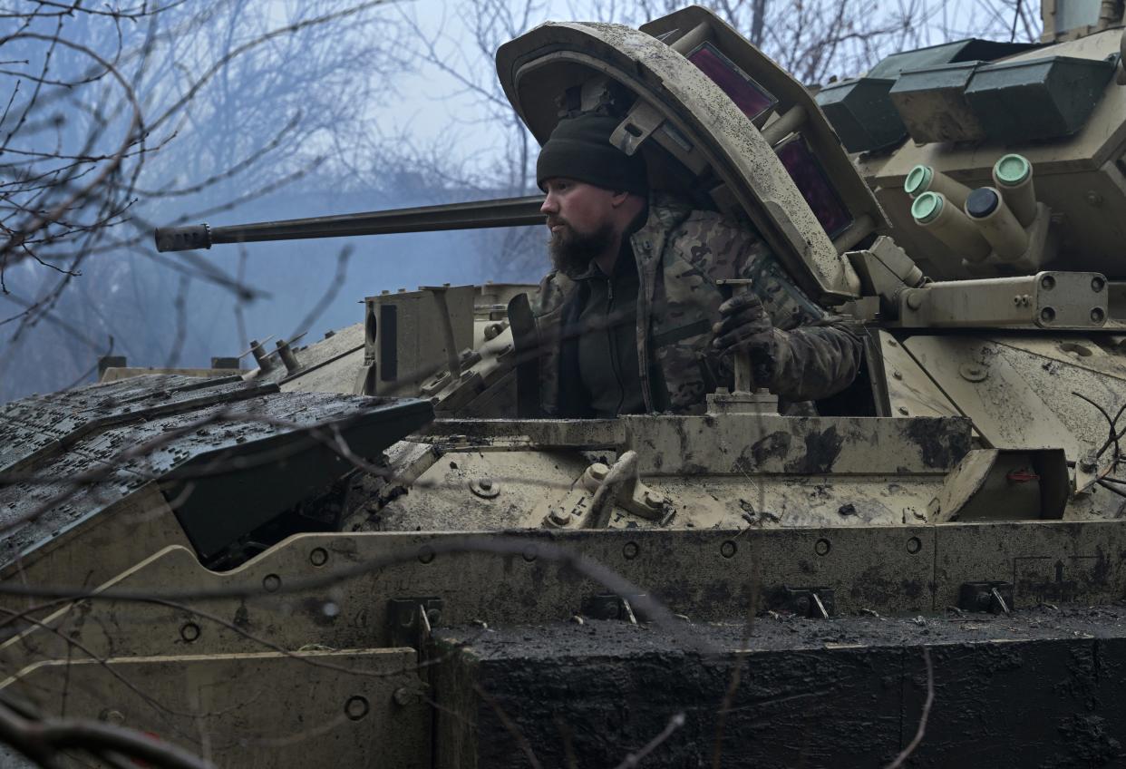 A Ukrainian serviceman of the 47th Mechanized Brigade prepares for combat a Bradley fighting vehicle, not far away from Avdiivka, Donetsk region on Feb. 11, 2024, amid the Russian invasion of Ukraine.