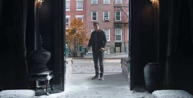 Peter standing at the doorway to a snow-covered Sanctum Sanctorum in "Spider-Man: No Way Home"