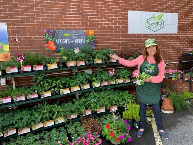 Warrington Hardware & Marine owner Marilyn Gleaton shows off the store's garden section last year. After 80 years in business, the Barrancas Avenue staple will close its doors this year.