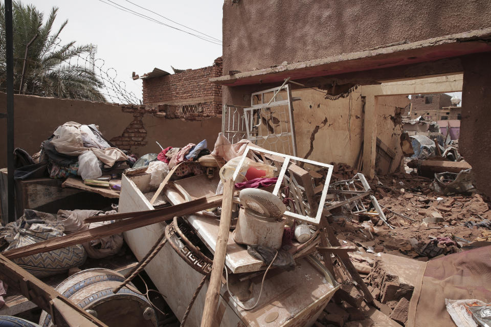 FILE - A house hit in recent fighting is seen in Khartoum, Sudan, Tuesday, April 25, 2023. Khartoum, a city of some 5 million people, has been transformed into a front line in the grinding conflict between Gen. Abdel Fattah Burhan, the commander of Sudan’s military, and Gen. Mohammed Hamdan Dagalo, who leads the powerful paramilitary group known as the Rapid Support Forces. The outbreak of violence has dashed once-euphoric hopes for a democratic transition in Sudan after a popular uprising helped oust former dictator Omar al-Bashir. (AP Photo/Marwan Ali, File)