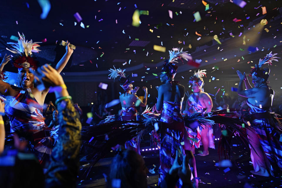 Performers celebrate at the finish of the Mahu Magic drag show at the Western Regional Native Hawaiian Convention, Tuesday, June 20, 2023, in Las Vegas. (AP Photo/John Locher)