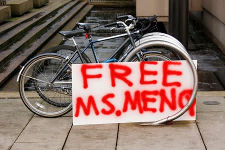 FILE PHOTO: A sign in support of Huawei CFO Meng Wanzhou is displayed outside of the B.C. Supreme Court bail hearing of Meng, who is being held on an extradition warrant in Vancouver, British Columbia, Canada December 10, 2018. REUTERS/David Ryder/File Photo