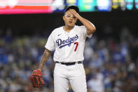 Los Angeles Dodgers pitcher Julio Urias reacts after giving up an RBI single to Atlanta Braves' Joc Pederson during the third inning in Game 4 of baseball's National League Championship Series Wednesday, Oct. 20, 2021, in Los Angeles. (AP Photo/Jae Hong)