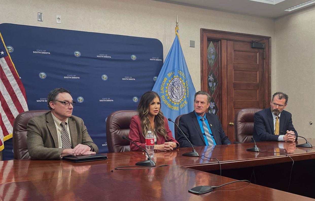 Gov. Kristi Noem and Lt. Gov. Larry Rhoden, along with two members of Noem's cabinet, meet with reporters on Thursday, Feb. 1, 2024, at the South Dakota Capitol in Pierre.