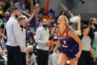 Phoenix Mercury guard Sophie Cunningham (9) reacts after scoring during the second half in the first round of the WNBA basketball playoffs against the Phoenix Mercury, Thursday, Sept. 23, 2021, in Phoenix. Phoenix won 83-82. (AP Photo/Rick Scuteri)