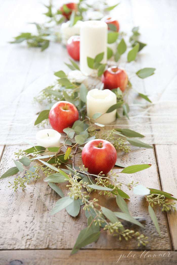 <p>Your apple picking days may be long gone, but that doesn't mean you can't use grocery store finds to dress up the center of the table. </p><p><em><a href="https://julieblanner.com/easy-entertaining-ideas-for-fall/" rel="nofollow noopener" target="_blank" data-ylk="slk:Get the tutorial at Julie Blanner »;elm:context_link;itc:0;sec:content-canvas" class="link ">Get the tutorial at Julie Blanner »</a></em></p>