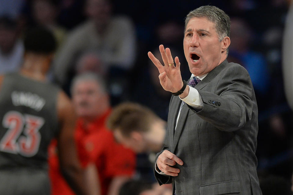 ATLANTA, GA  FEBRUARY 12:  Louisville assistant coach Dino Gaudio gestures from the sideline during the NCAA basketball game between the Louisville Cardinals and the Georgia Tech Yellow Jackets on February 12th, 2020 at Hank McCamish Pavilion in Atlanta, GA.  (Photo by Rich von Biberstein/Icon Sportswire via Getty Images)