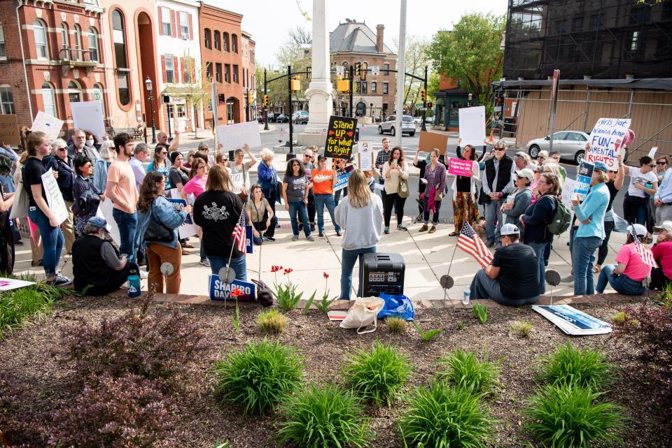 Dozens of demonstrators gather at the intersection of Main and Court streets during a rally held in downtown Doylestown Borough calling for the protection of abortion rights, on Tuesday, May 3, 2022.