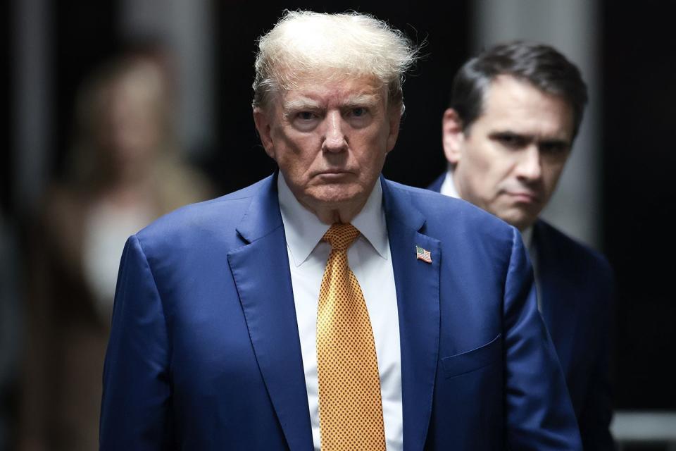 <p>Win McNamee/Getty</p> Donald Trump at  Manhattan Criminal Court on May 7, 2024