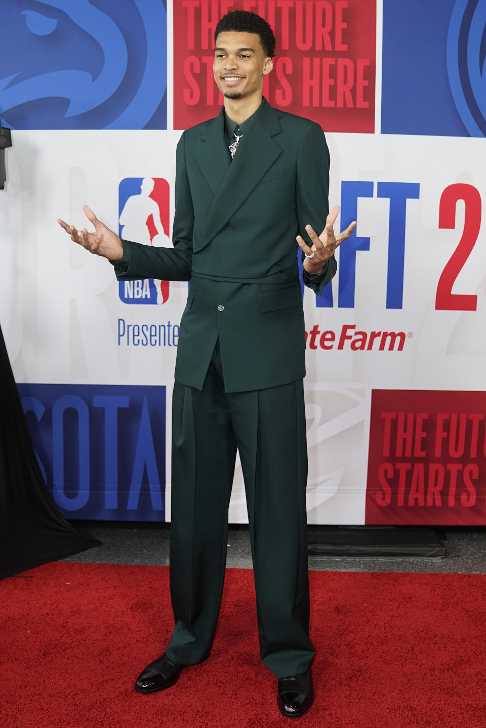 Victor Wembanyama arrives at Barclays Center before the NBA basketball draft, Thursday, June 22, 2023, in New York. (AP Photo/John Minchillo)