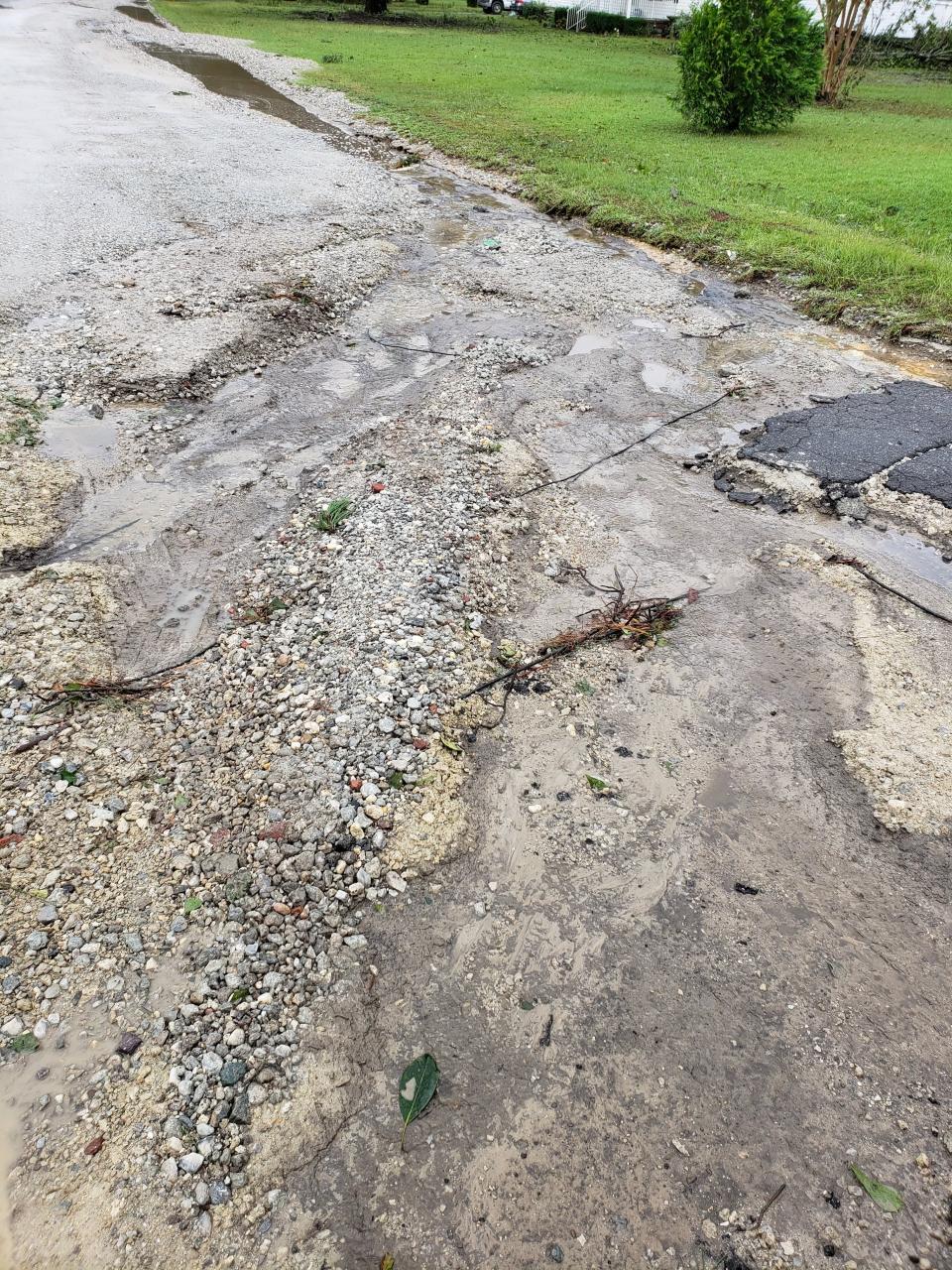 Rocky Point Resident Sarah Prevatte said she lost cable service a few times because of road washouts on Arvida Spur Road. Prevatte's cable wire can be seen in this road washout.