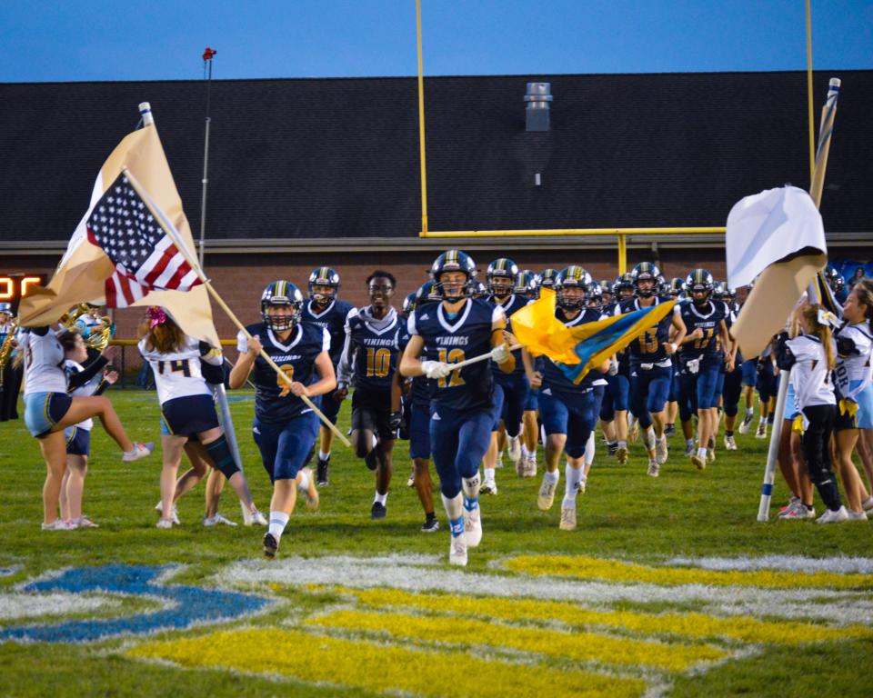 River Valley takes the field before playing Shelby last season. The Vikings dropped to Division IV's Region 14 after competing in recent years in Division III in high school football.