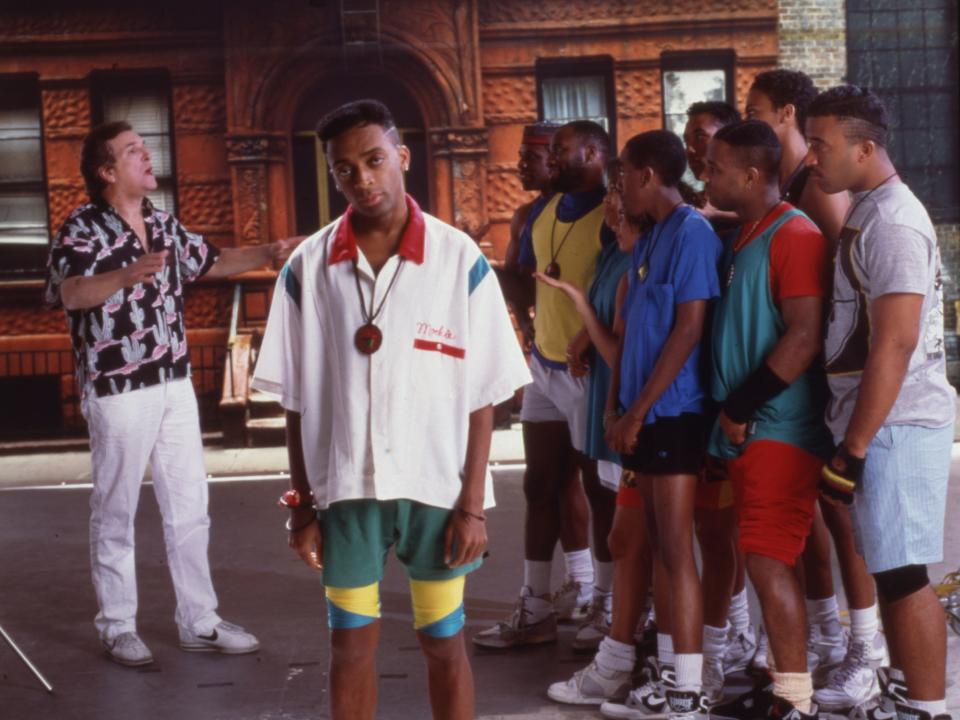 Portrait of director and actor Spike Lee (center) on the set of his film "Do the Right Thing."