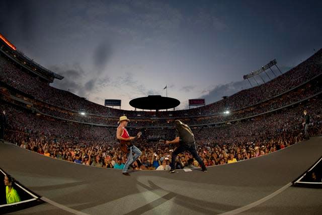Kenny Chesney on stage at Kansas City's GEHA Field at Arrowhead Stadium in June 2022. Chesney will hit the road again this spring and summer with the Zac Brown Band, Uncle Kracker and Megan Moroney. The Sun Goes Down Tour launches April 20 in Tampa.