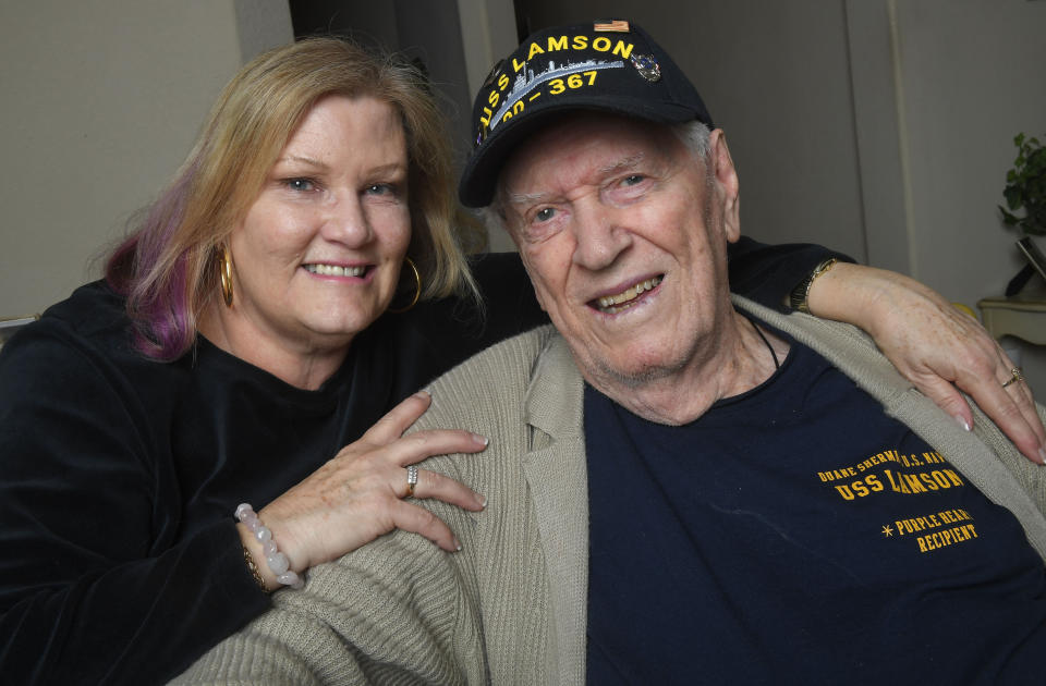 In this Tuesday, Jan. 8, 2019 photo Sue Morse and her dad Duane Sherman, 96, pose for a photo at their home in Fullerton, Calif. Sue posted on social media asking friends to send him a birthday card to cheer him up. It went viral and they've received over 50,000 cards and gifts so far. (Kevin Sullivan/The Orange County Register via AP)