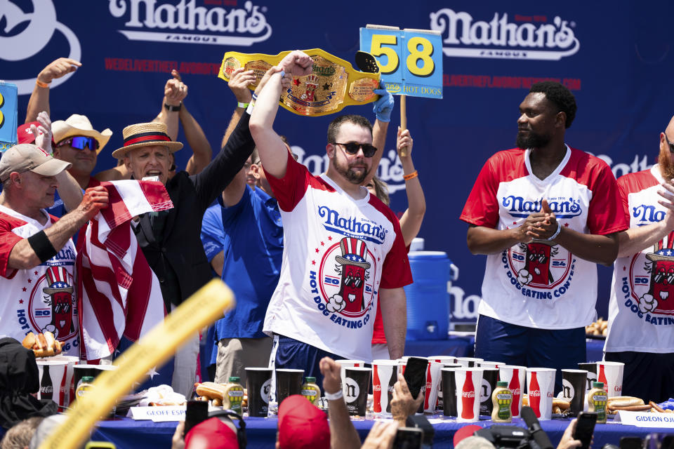 Patrick Bertoletti, 26, celebrates winning the men’s contest at the Nathan