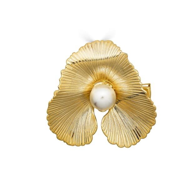 <p>Epona Valley Violet Hair Clip, $78, <a href="https://www.eponavalley.com/collections/combs-barrettes-clips/products/violet-pearl-clip" rel="nofollow noopener" target="_blank" data-ylk="slk:available here;elm:context_link;itc:0;sec:content-canvas" class="link ">available here</a>.</p>
