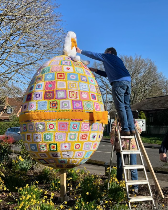 The giant egg is made of 260 crocheted squares (Philippa Etheridge/PA)